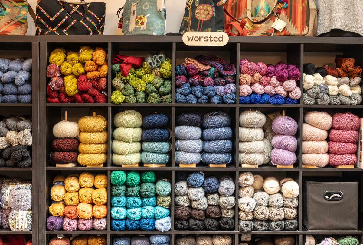 Display of colorful yarns in Skein Yarn Shop.
