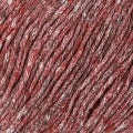 Close up photo of the strands of yarn that showcases a rich, deep red hue with subtle variations in tone. 