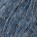 Blue yarn with flecks of gray shown up close from this Berroco yarn called Dusk.