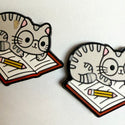 Reading Cat Eyes open